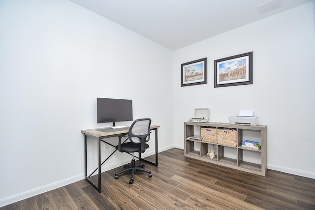 office with dark hardwood / wood-style floors