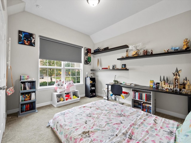 bedroom featuring light carpet and vaulted ceiling