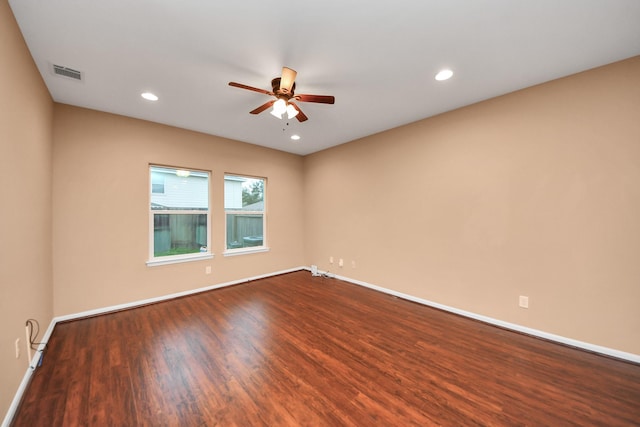 unfurnished room featuring hardwood / wood-style floors and ceiling fan