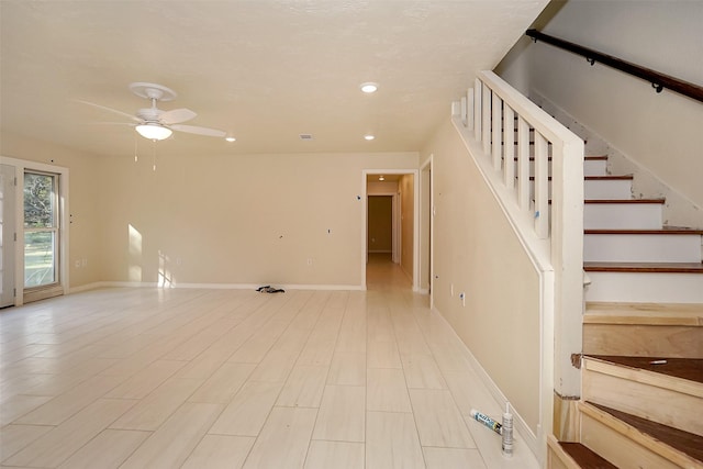 interior space featuring ceiling fan