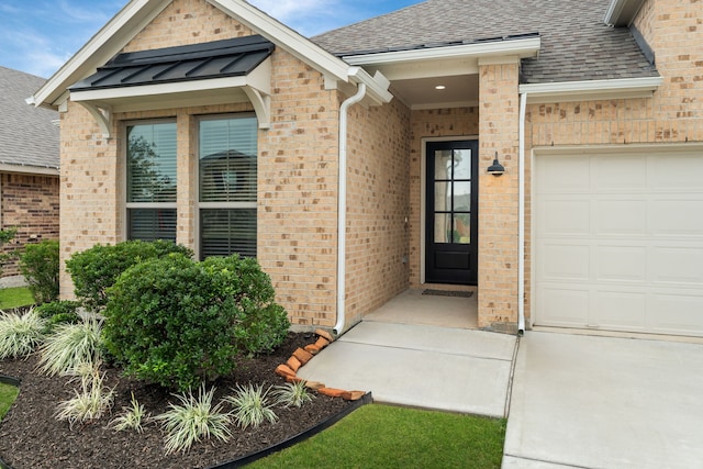 entrance to property featuring a garage