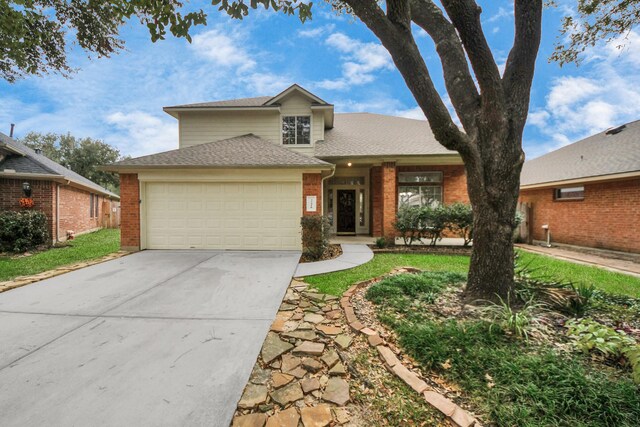 view of front of property with a garage