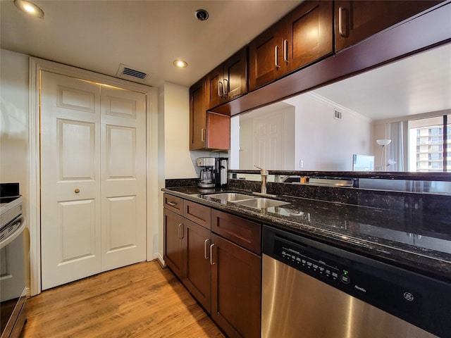 kitchen featuring dark stone countertops, dishwasher, light hardwood / wood-style flooring, and sink