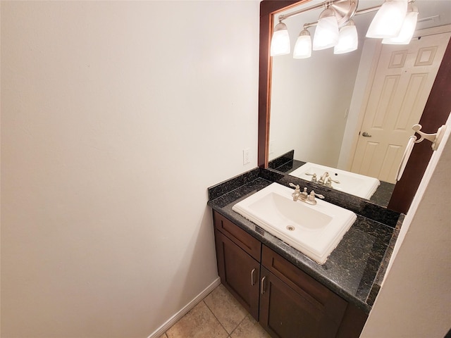 bathroom with tile patterned flooring and vanity