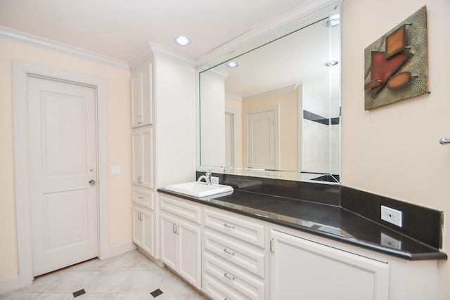 bathroom with vanity, tile patterned floors, and crown molding