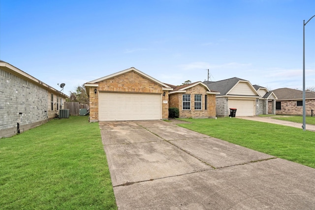 ranch-style home with a garage, central air condition unit, and a front yard