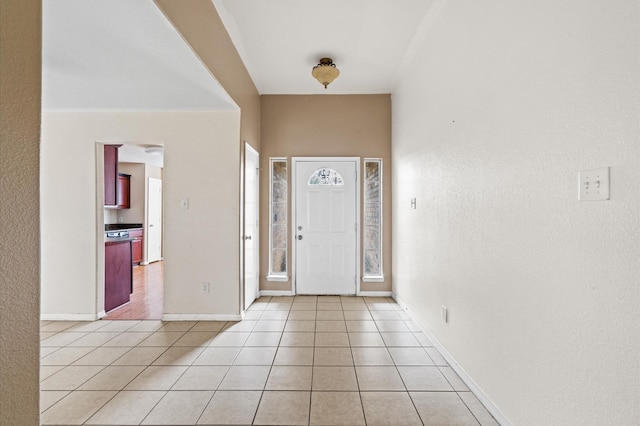 entryway with light tile patterned floors