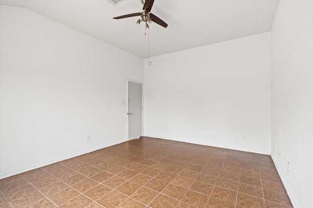 spare room with ceiling fan and lofted ceiling