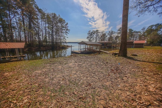 dock area with a water view