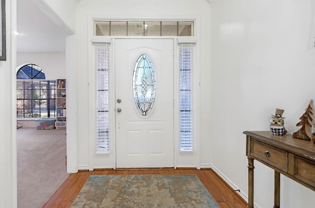 foyer entrance with hardwood / wood-style floors