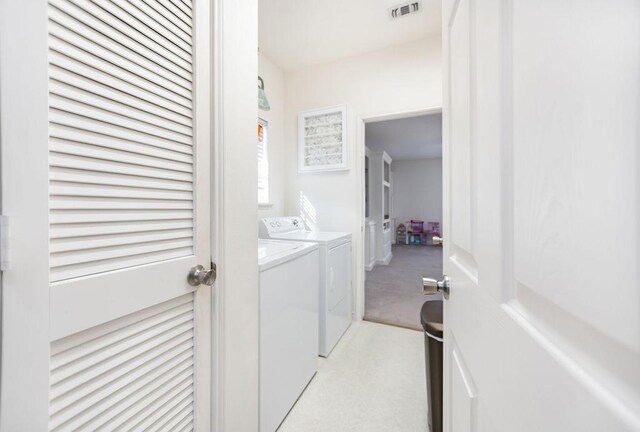 laundry area featuring separate washer and dryer