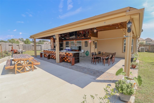 view of patio / terrace with ceiling fan