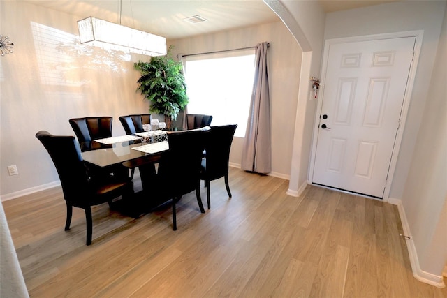 dining space featuring light hardwood / wood-style floors