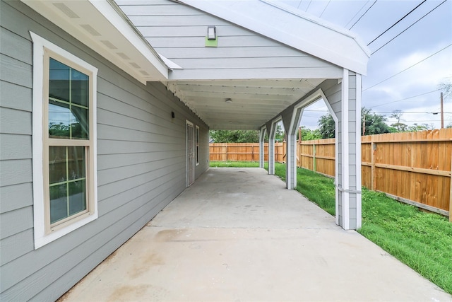 view of patio / terrace with a carport