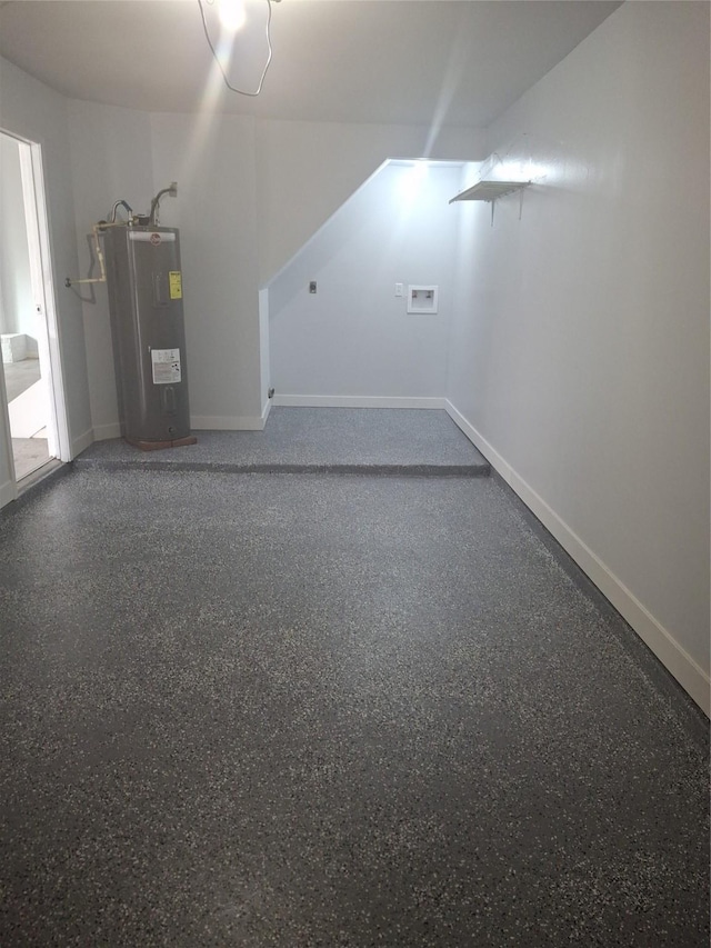 interior space featuring baseboards and electric water heater