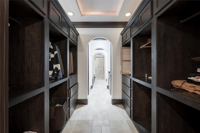 mudroom with a raised ceiling