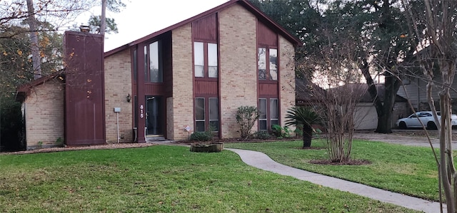 view of front of property with a front lawn