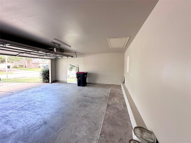 garage featuring a garage door opener