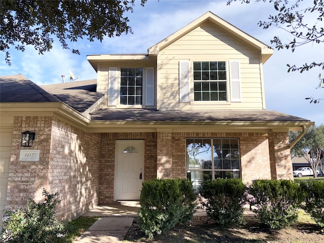 view of front of home featuring covered porch