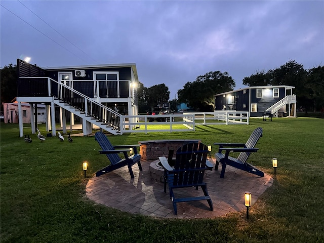 view of yard with a patio area and an outdoor fire pit