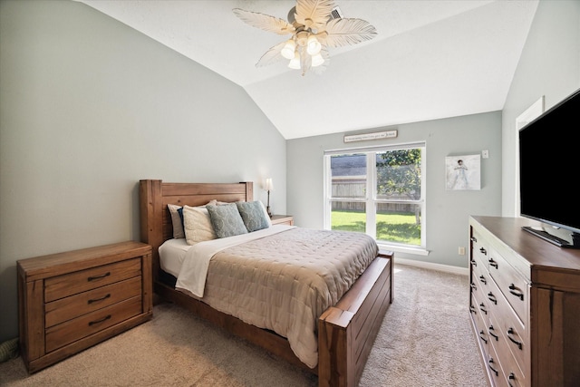 carpeted bedroom featuring ceiling fan and lofted ceiling