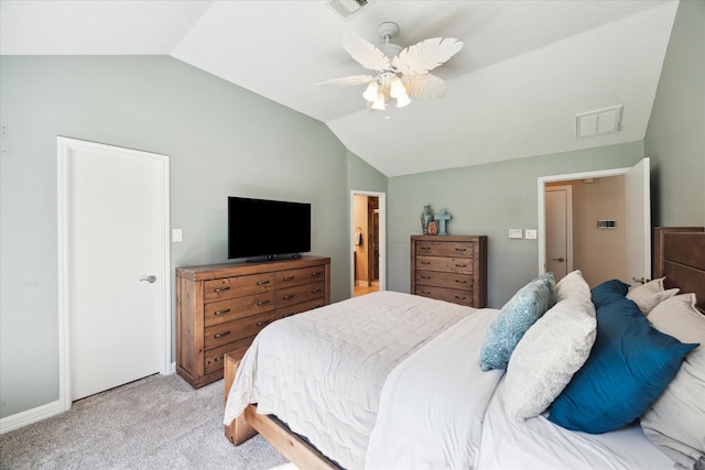 bedroom featuring ceiling fan, light carpet, and vaulted ceiling