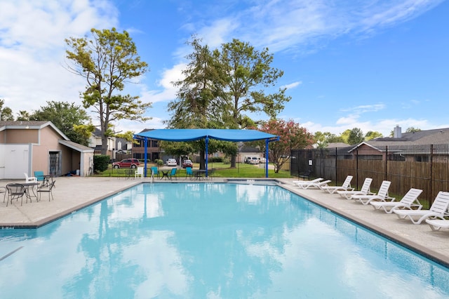 view of pool featuring a patio