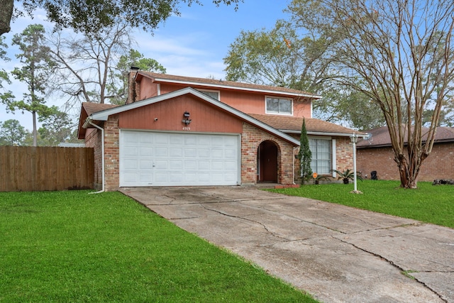 view of front of home featuring a front lawn and a garage