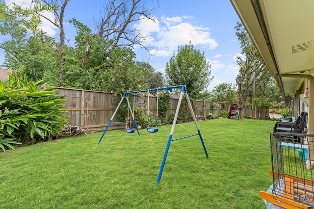 view of playground featuring a lawn