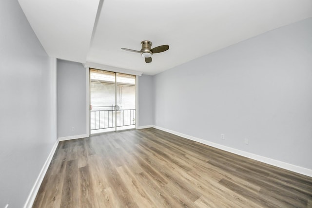 unfurnished room featuring ceiling fan and light wood-type flooring