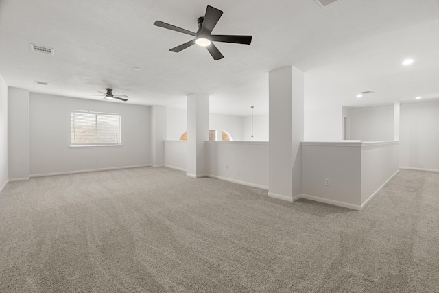 carpeted empty room with ceiling fan