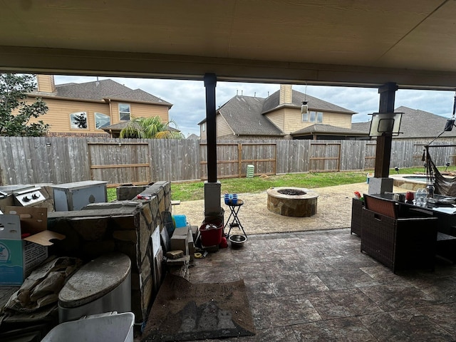 view of patio featuring a fire pit