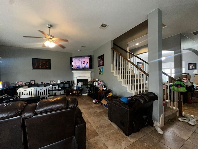 living room featuring ceiling fan