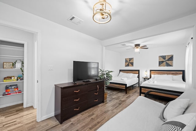 bedroom with light hardwood / wood-style floors