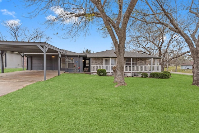 ranch-style home featuring a garage, a front yard, a carport, and a porch