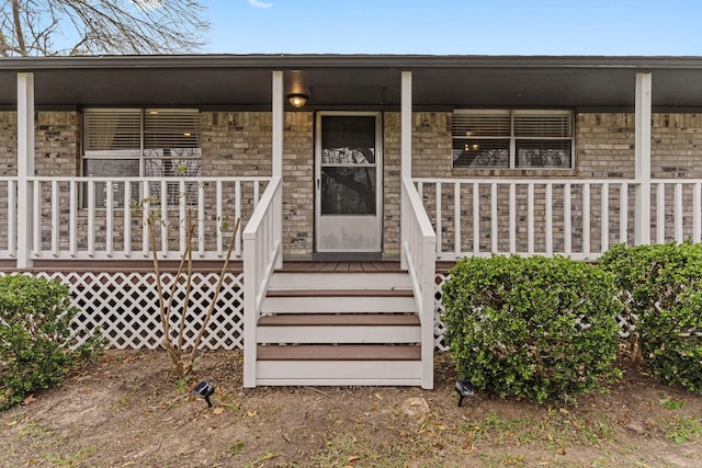 property entrance with a porch