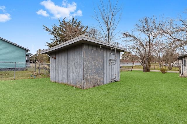 view of outdoor structure with a yard