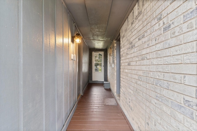 hall with dark wood-type flooring