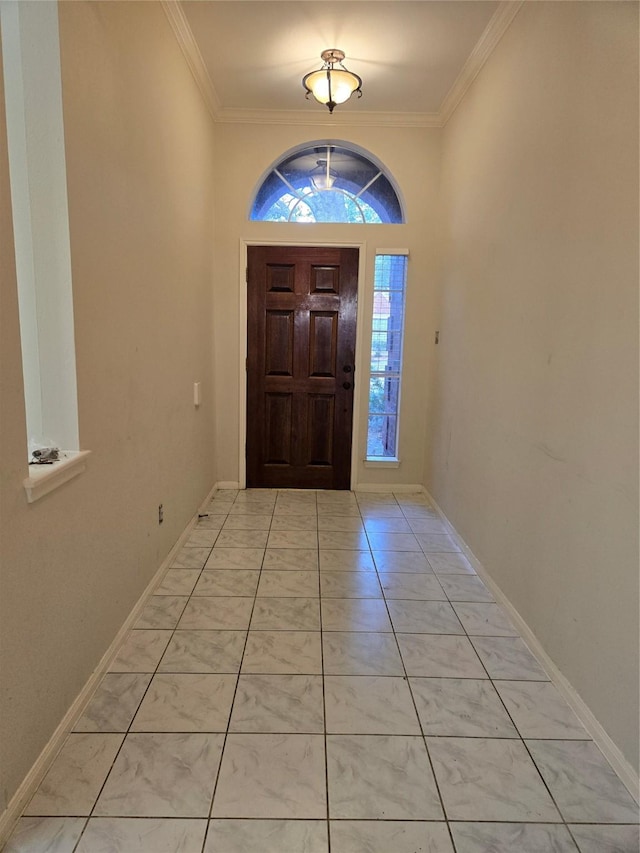 foyer featuring crown molding