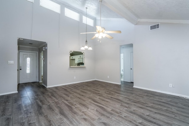 interior space featuring dark hardwood / wood-style flooring, high vaulted ceiling, a textured ceiling, ceiling fan with notable chandelier, and ornamental molding