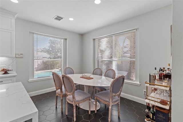 view of tiled dining space