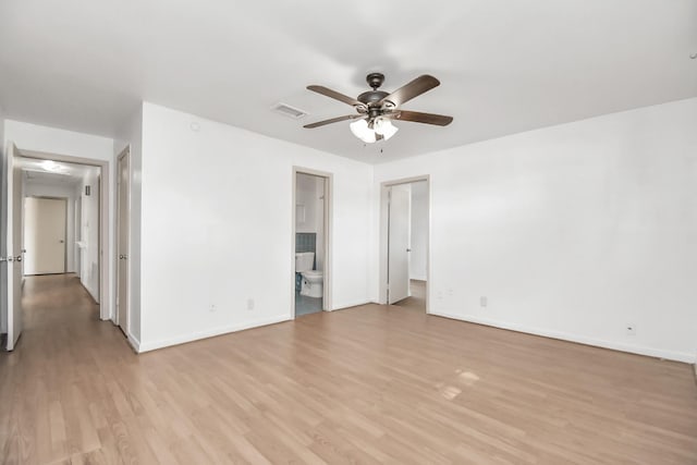 spare room featuring ceiling fan and light wood-type flooring