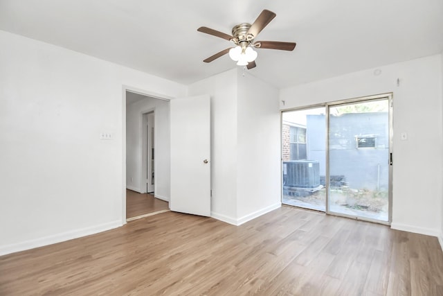 unfurnished room featuring ceiling fan and light hardwood / wood-style flooring