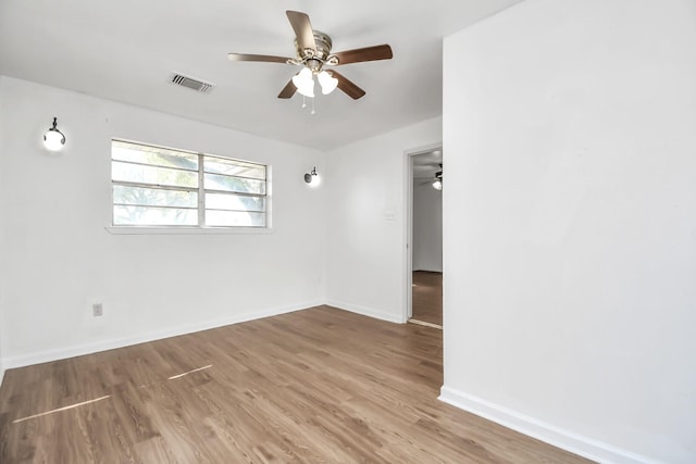 empty room with wood-type flooring