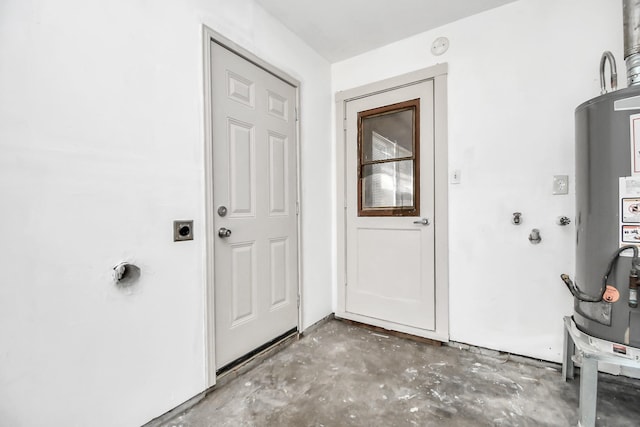 doorway to property featuring water heater