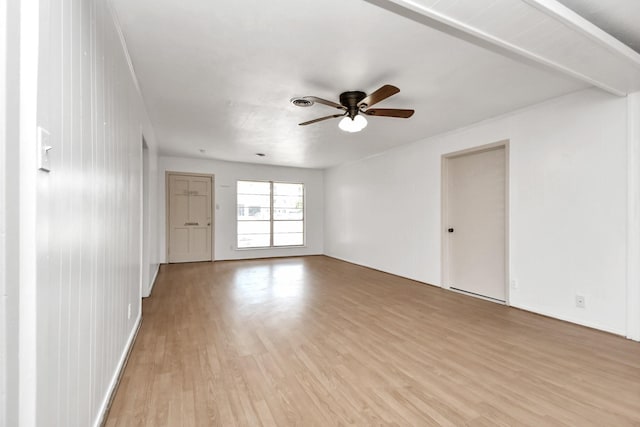 spare room featuring ceiling fan and light wood-type flooring