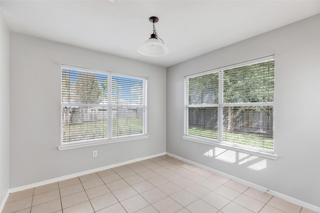 view of tiled spare room