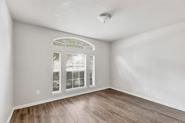 empty room featuring hardwood / wood-style floors