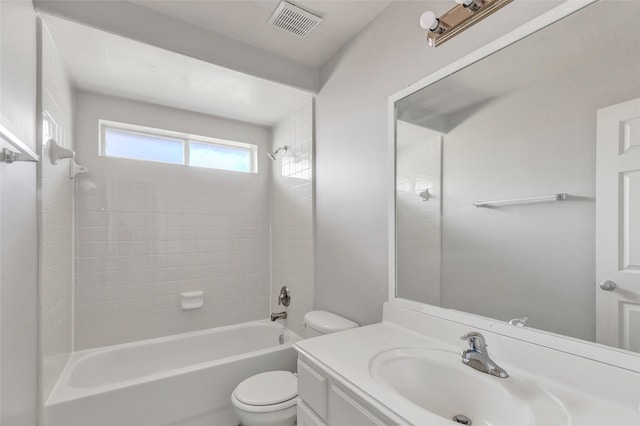 full bathroom with bathtub / shower combination, vanity, and toilet