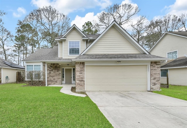 view of front of home with a garage and a front lawn